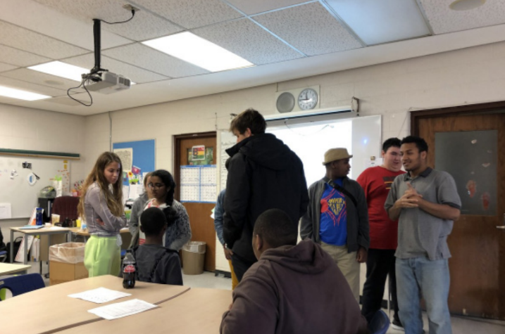 Students play name games, socialize during Unified cub meeting on Dec. 16.