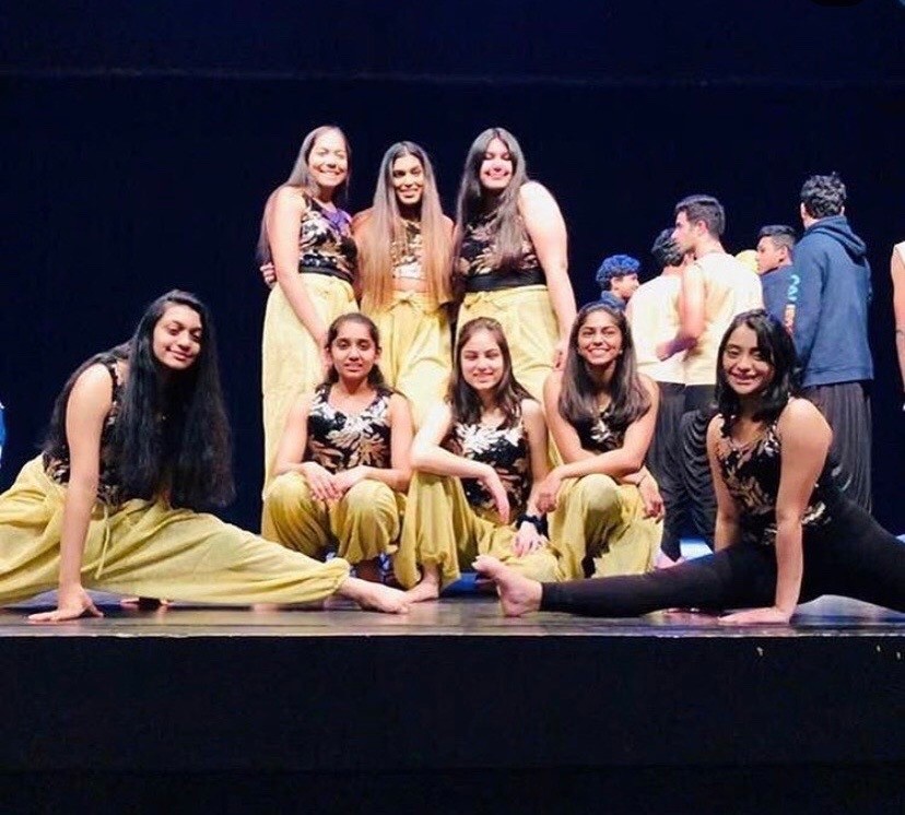 Sophomore Durva Chavarkar(bottom far right) with the rest of the girls in Indian Student Association after the Multi Cultural Show in 2019. 