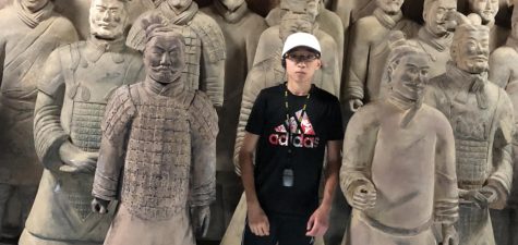 Sophomore Andrew Ma standing amongst some terracotta warriors during a trip to China. 