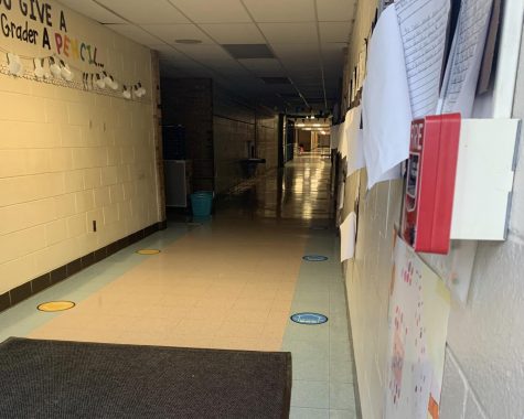 The halls of Logan Elementary school have been marked with social distancing stickers. This is one of many initiatives pushed by Ann Arbor Public Schools to work towards in-person schooling. 
