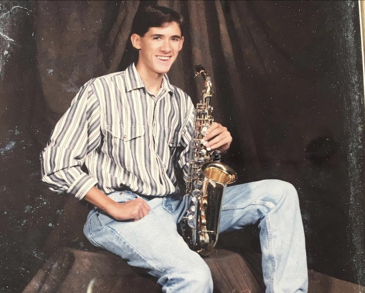 Robert Fox poses in his senior photo with his beloved saxophone.