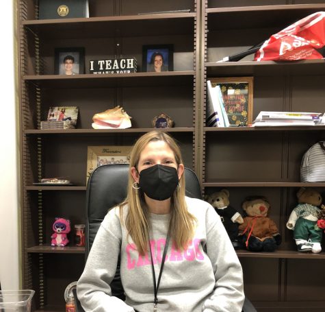 Ms. King-Freyre observes masking policies, while sitting in her office in the English Department.