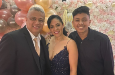 Wilmer Lazo Garcia with his mom and stepdad enjoying a quince they were at. 