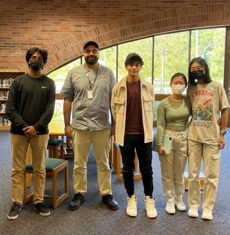 Mike Devries visits the SAV Club in the Huron High School library to discuss plans to improve the labeling of plant-based options and introduce vegan options in AAPS lunches. From left to right, Arav Bhojani, Mike Devries, Max Samaha, Zoe Zhang, and Serena Chang
