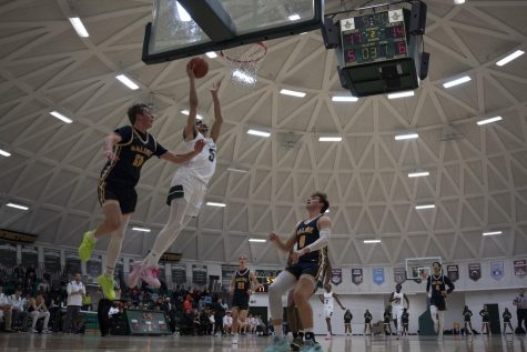 Trojan Obliteration: Varsity Mens Basketball Wins 58-27