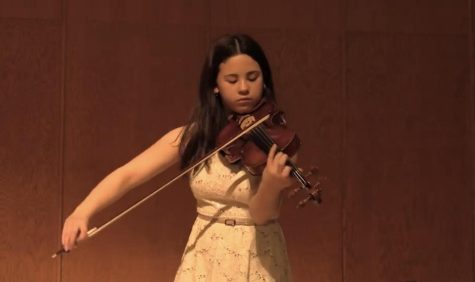 Dowell plays the violin and is learning Chinese.