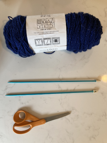 1. To get started when knitting, there are three essential materials. Yarn, knitting needles, and scissors. Make sure that your knitting needles correlate to the weight of your yarn (this will be on the skein of yarn).