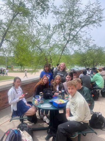 Miao and Newhouse with a group of German exchange students during lunch.
