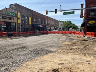Construction on State Street right on the border of the University of Michigans central campus will continue through the summer. Photo credit: Sara Neevel.