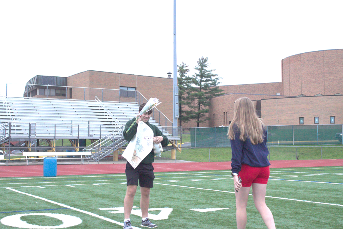 Senior Nick Bowers Hoco-poses to Natalie Bohnsack. She said yes!