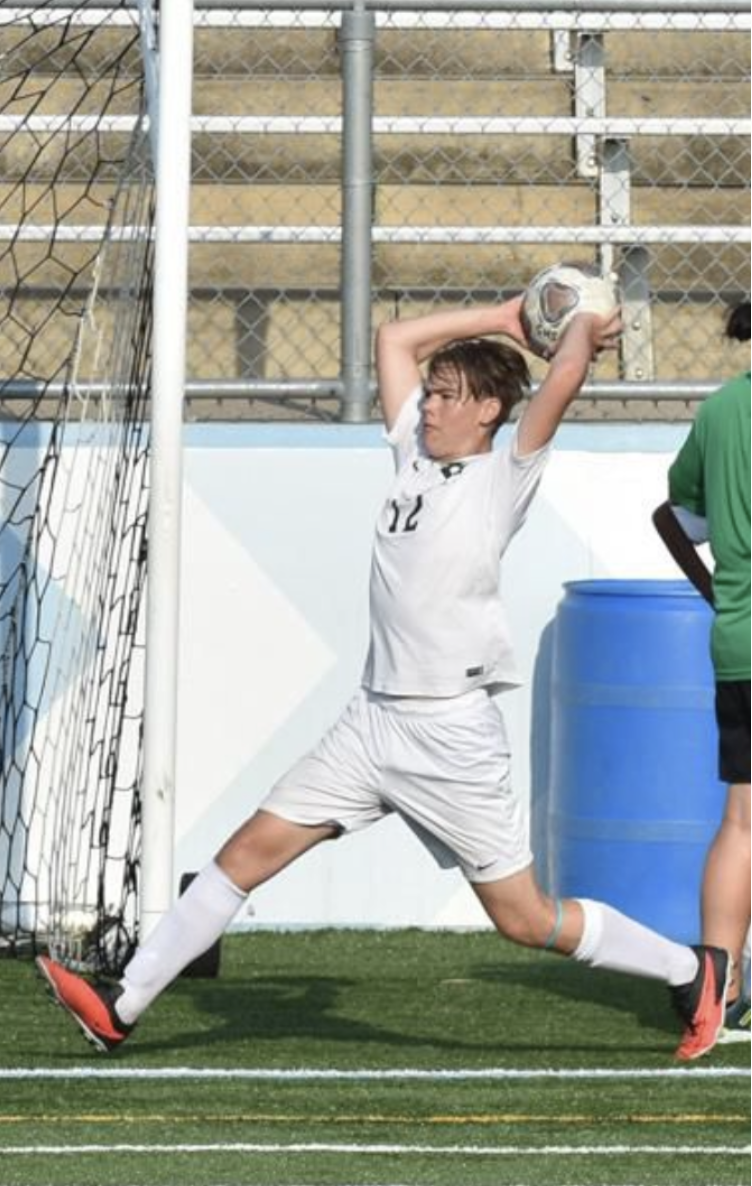 Turner taking a throw-in at a soccer game against Skyline. Photo courtesy of Turner.