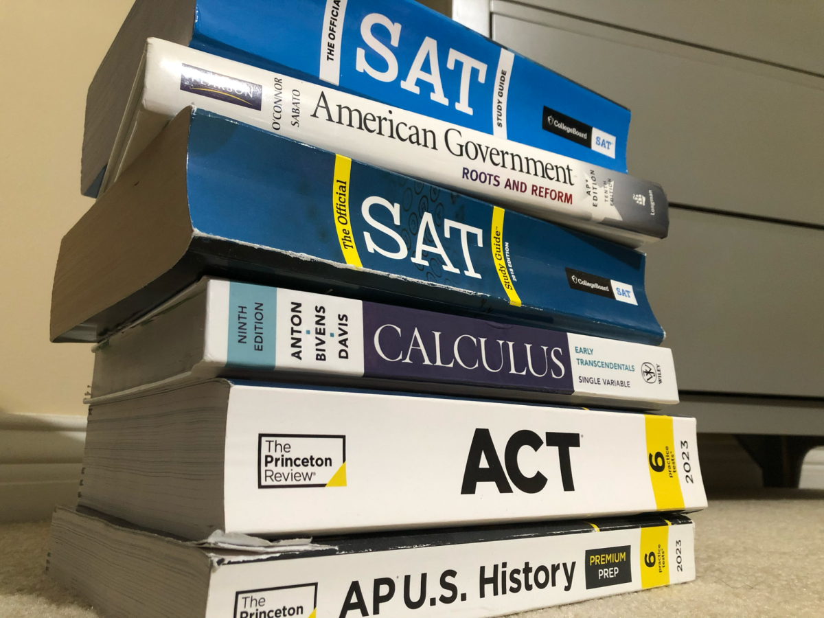 A stack of exam preparation books. The Princeton Review and The College Board are two of the most famous textbooks for AP exam review. 