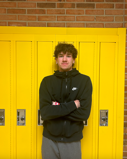 Delp posing in the yellow hallway. Photo courtesy of Delp