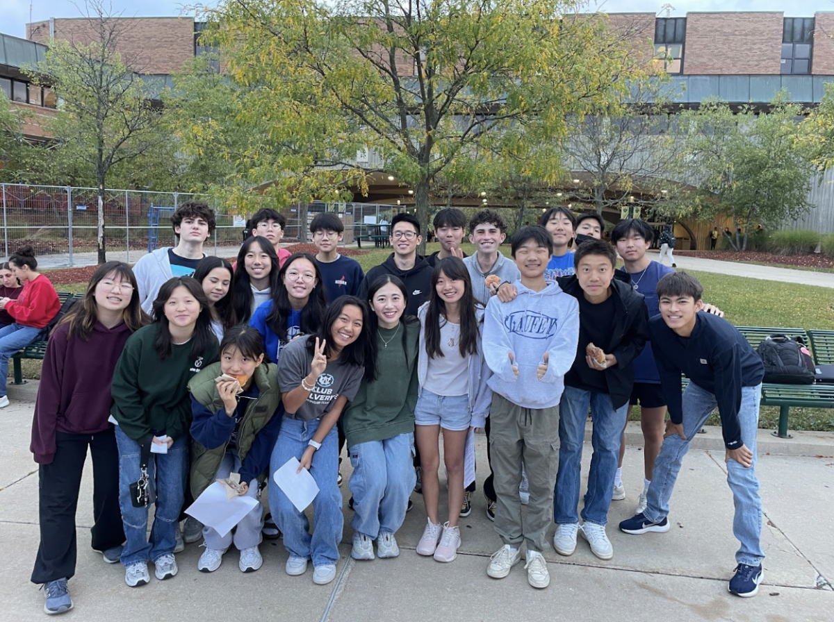 Huron students participating in See You At The Pole in front of Huron High School. Photo courtesy of Katherine Ma. 