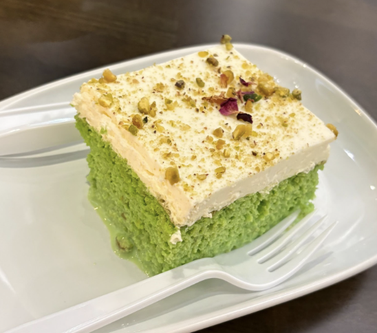 The Pistachio Milk Cake is a signature dessert at Moka & Co.