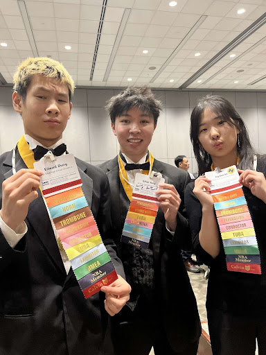 Yung posing with his friends at the DeVos Convention Center in Grand Rapids, Michigan, where the MSBOA All-State Conference was held. Photo courtesy of Yung