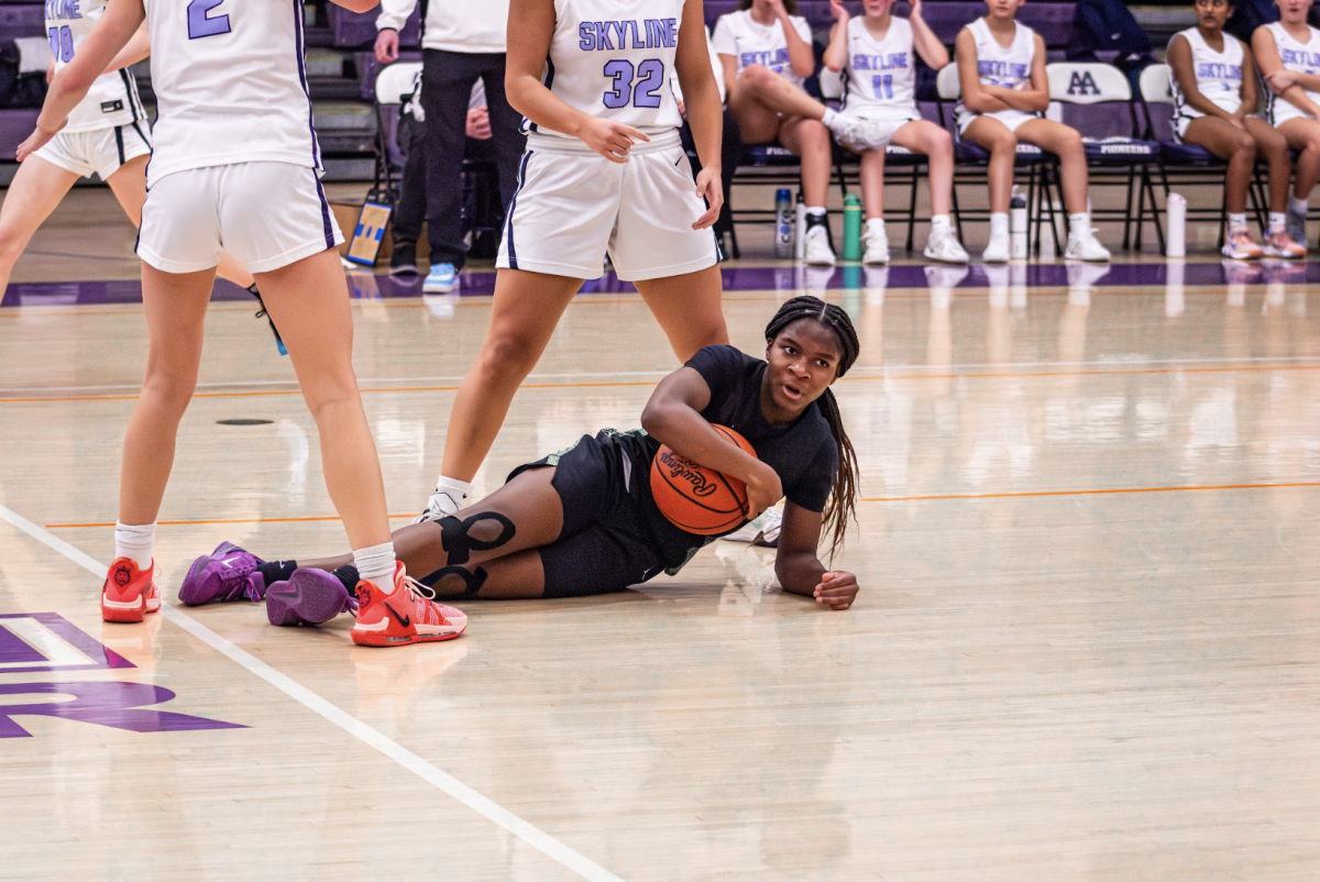 Freshman Chloe Frierson stole the ball from the opponent.