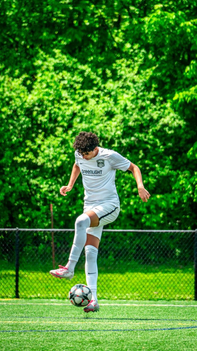 Junior Malic Kasham juggles and does tricks during his warm up before the game. 