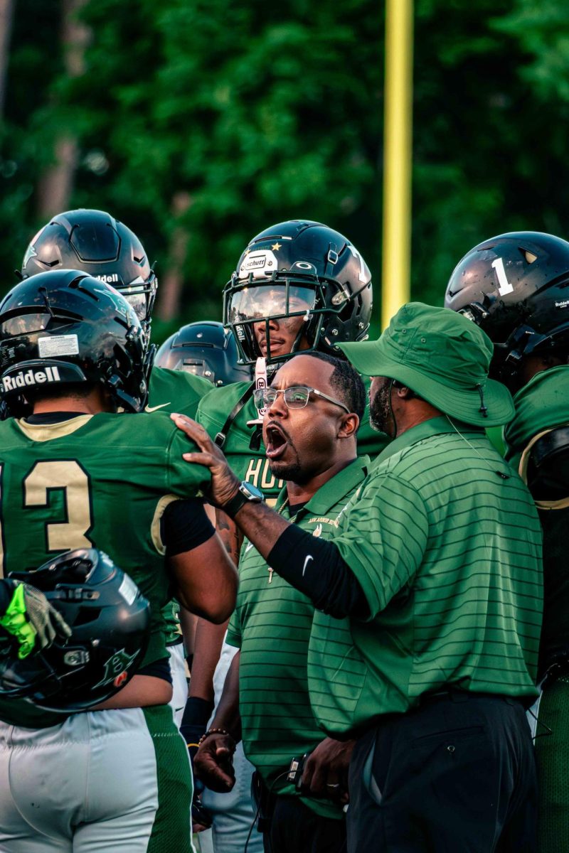 Huron Varsity Football Coach Jamonte Love calls the team out for their attitude and proceeds to instruct others. 