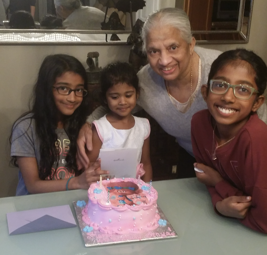 Nadarajah and her appama enjoy a birthday party together.