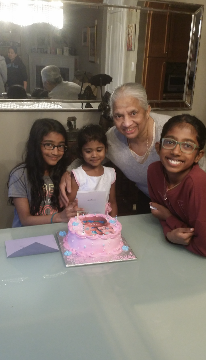 Nadarajah and her appama enjoy a birthday party together.