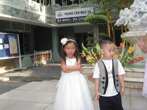 Photo of Dinh dressed up for a family wedding event in Vietnam. 