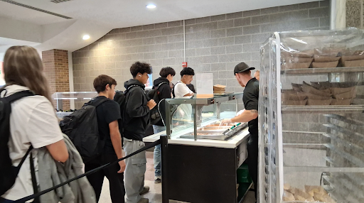 Students line up for hot lunch at Huron High School. For many school lunch is essential for their lives, but the expiration of the state’s budget means not every student will have guaranteed access anymore.