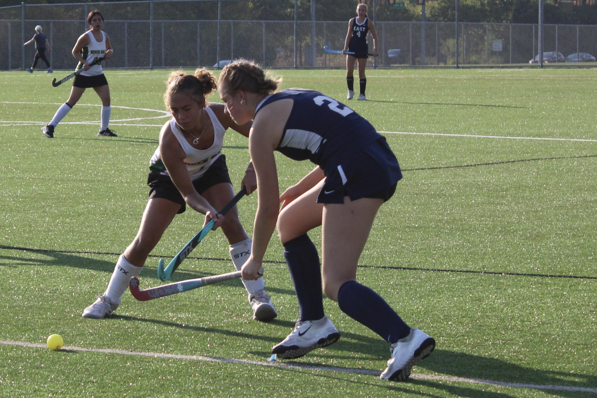 Freshman Kennedy Gayles attempts to clear the ball out to allow the midfielders to take the ball up the field.