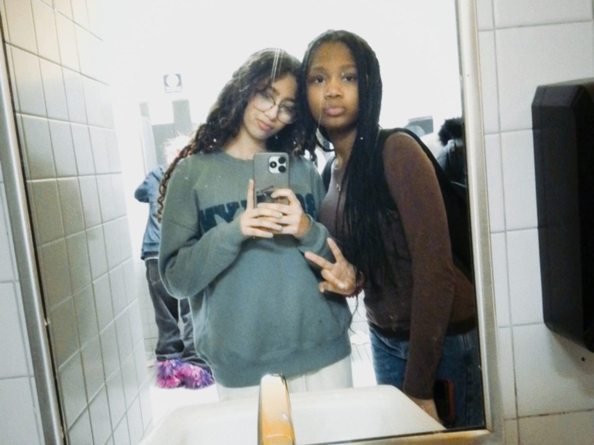 Chery posing for a picture with her friend. Courtesy of Chery. 