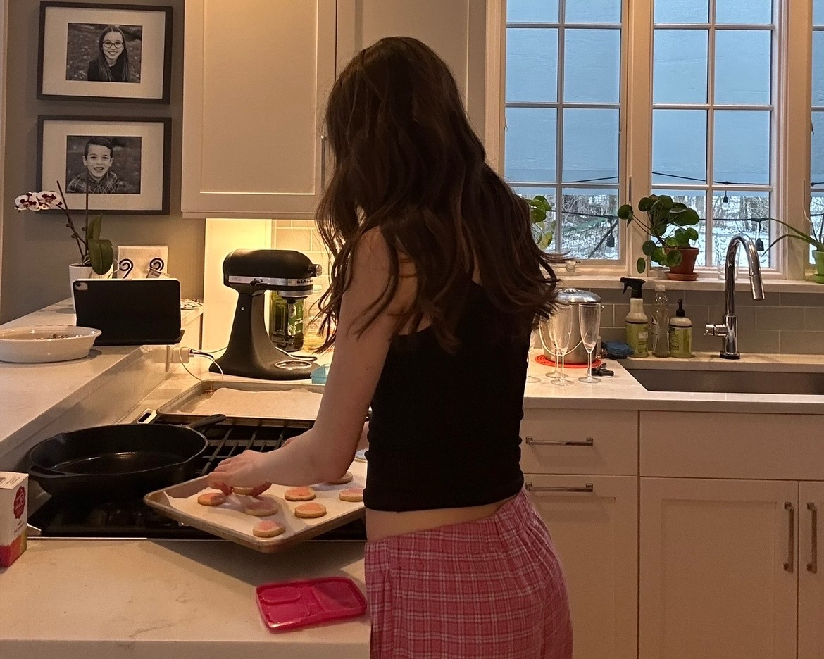 Senior Grace Johnson baking in her kitchen at home. 
