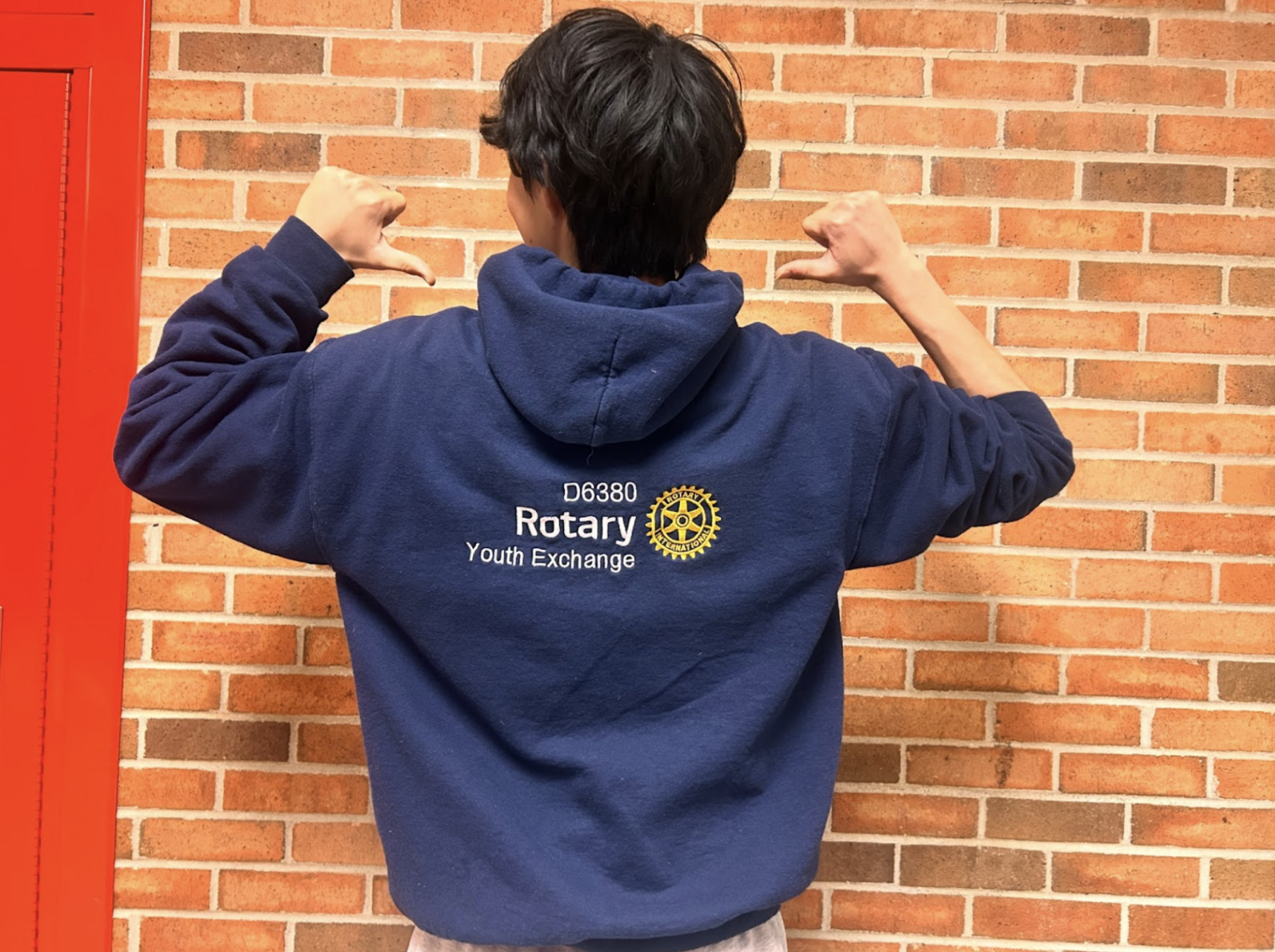 Senior Kotaro Hiroe, exchange student from Japan, showing the back of his hoodie that reads “Rotary Youth Exchange." “I want to do many things. I want to go to other states. I want to eat other food. I want to sight-see,” Hiroe said.