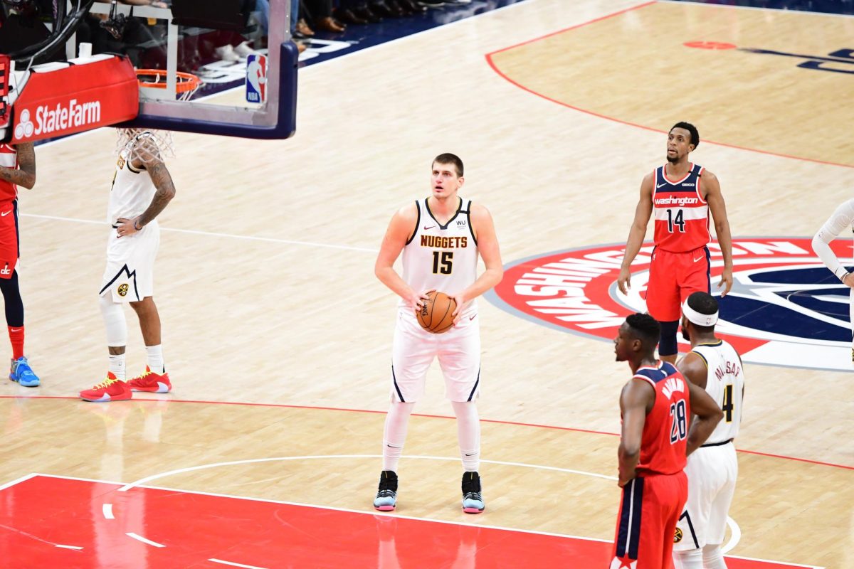 Nikola Jokic in playing in a game. Courtesy of Wikipedia Commons.