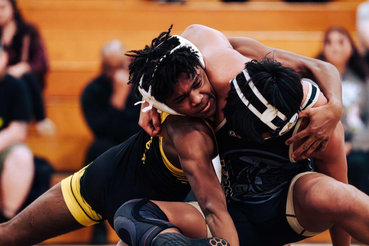 Looking for the pin is freshman Jackson Hutchings. 