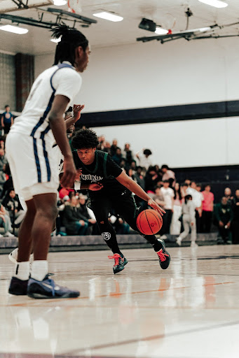 Junior Nate Sidney backs down the opponent, looking to make a big play in the most important game of the season.

