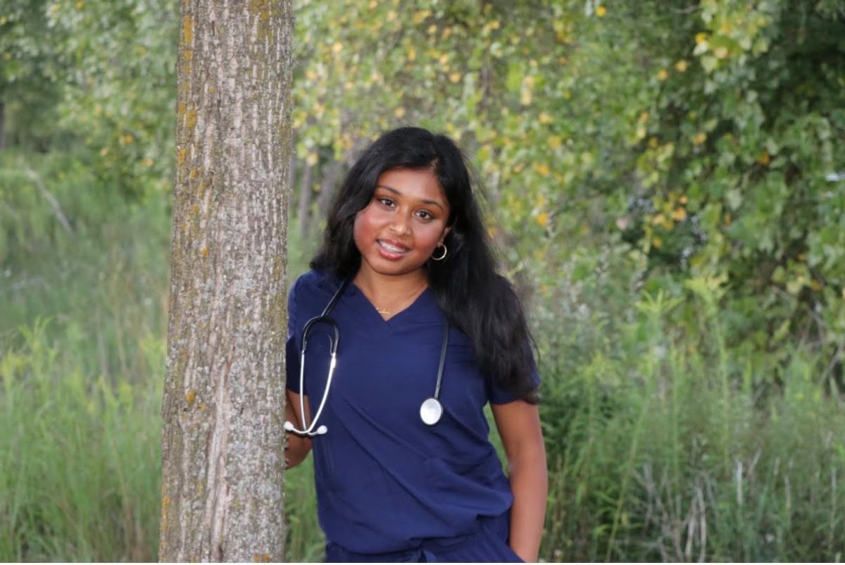 Huron senior Hannah Nixon poses for her senior photo. Nixon hopes to become a nurse after high school. Courtesy of Nixon.