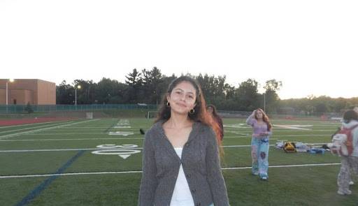 Ledezma posing on the football field during Senior Sunrise. Courtesy of Ledezma. 
