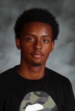 Thornton posing for his school picture. Courtesy of Thornton. 
