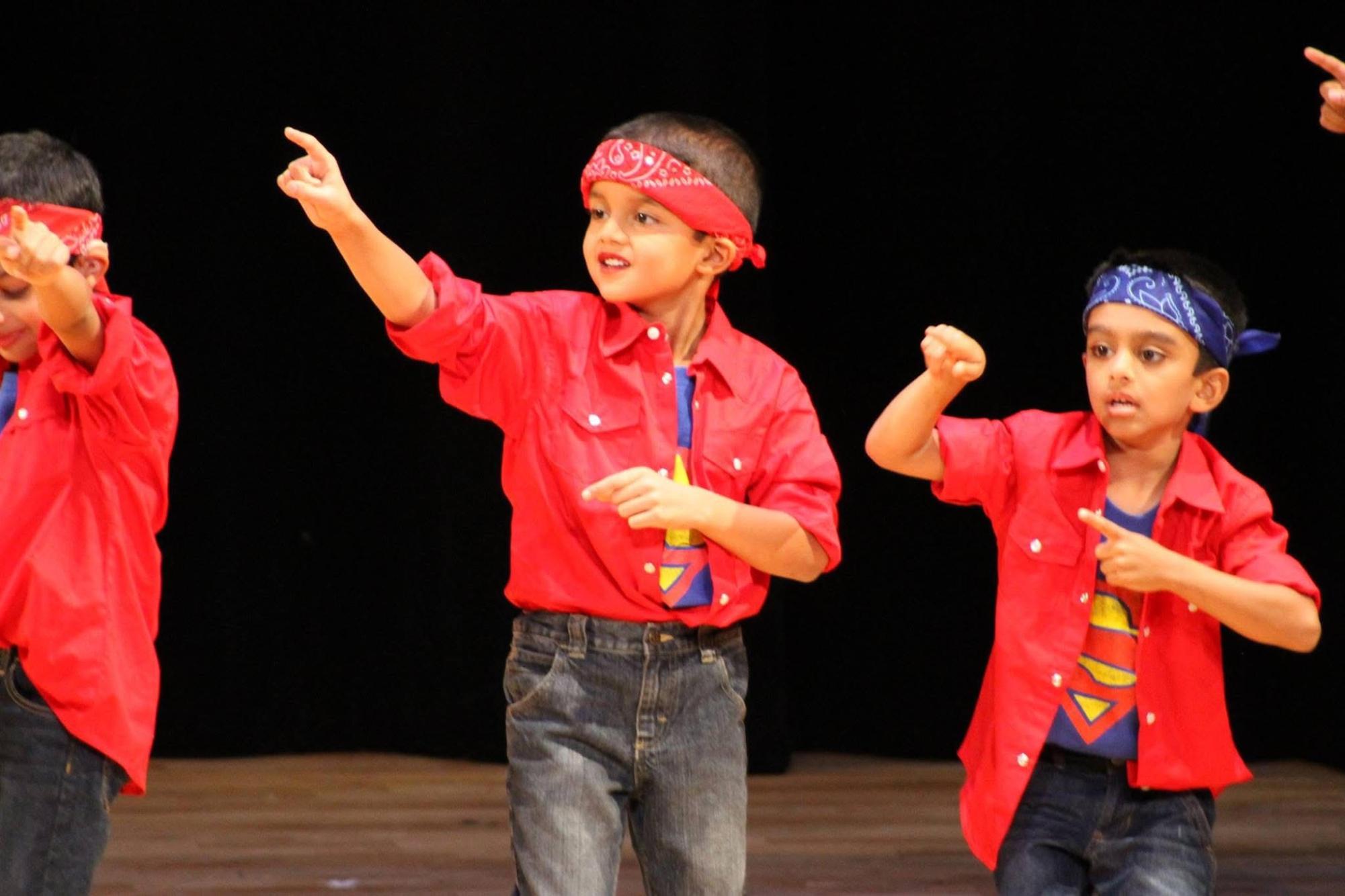 Kamat performs at a Marathi Mandal event as a child, dancing to various Bollywood songs. Photo courtesy of Kamat.