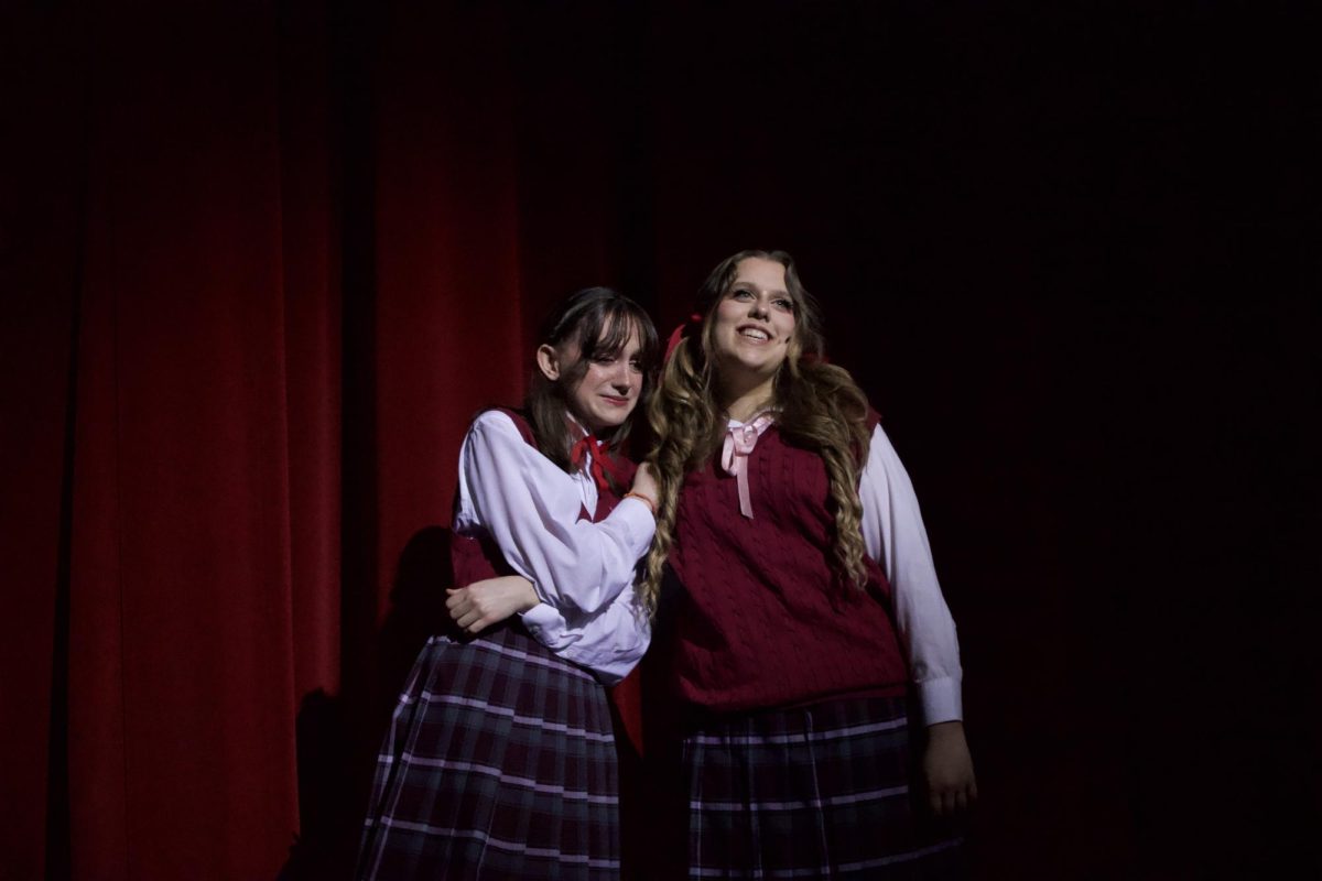 A moment unfolds as Sasena, on the left, stands beside Nelson, revealing a more emotional side of both characters.