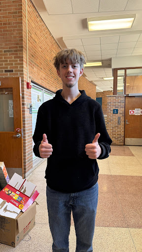 O'Leary posing inside a Huron hallway. Courtesy of O'Leary. 