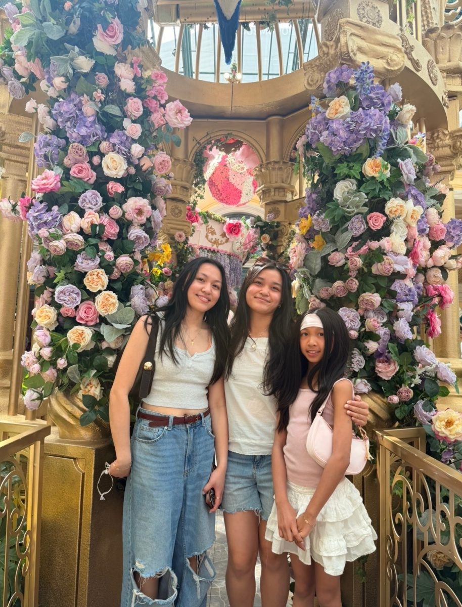 A picture of Rustia and her sisters smiling. Courtesy of Rustia.
